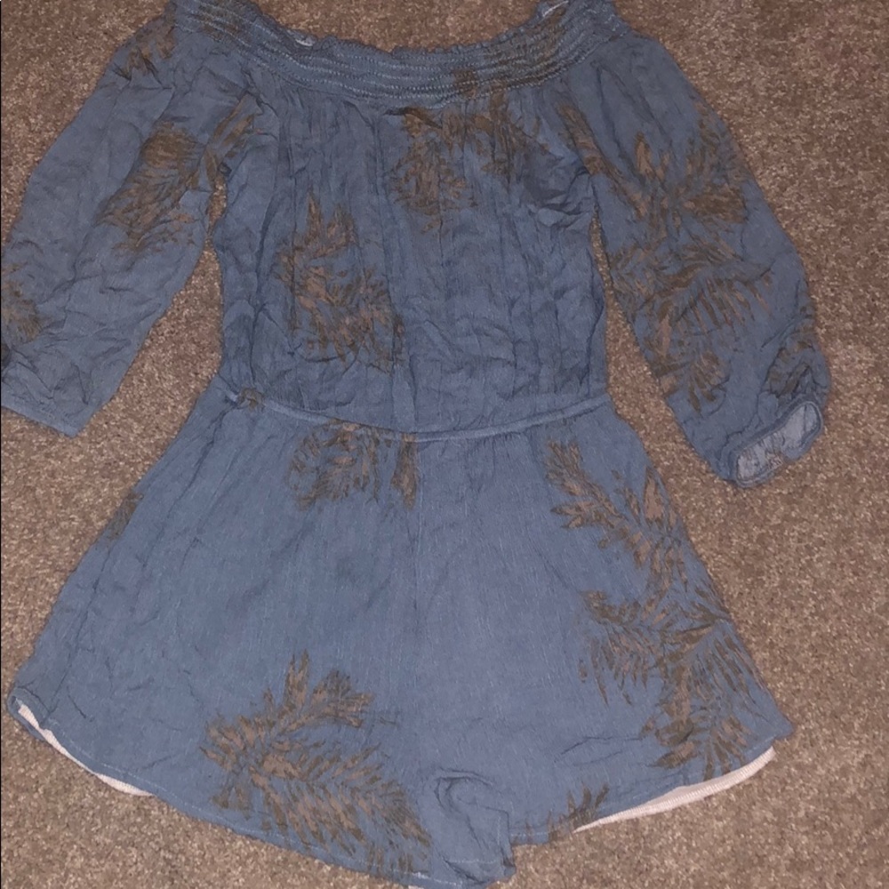 Blue romper with tan leaves super cute